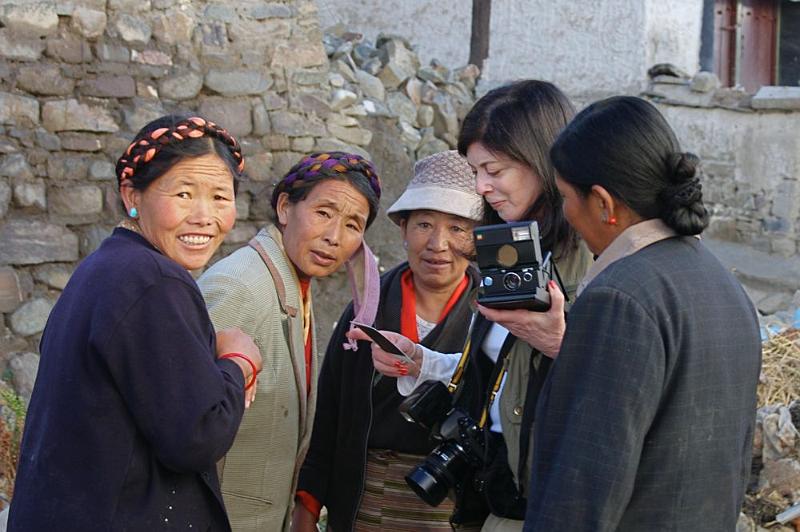 110 Leslye interacting with locals near Palkhor Chiode.jpg